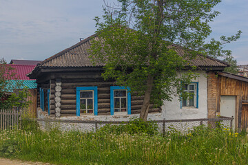 Fototapeta na wymiar Typical Russian wooden house in Kungur town, Russia
