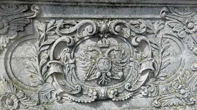 Medieval bas relief of the coat of arms of the Holy Roman Empire of the German nation in Regensburg, Germany