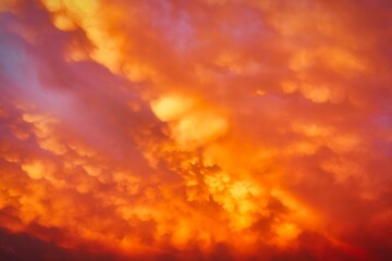 Clouds before sunset, the sky in orange color