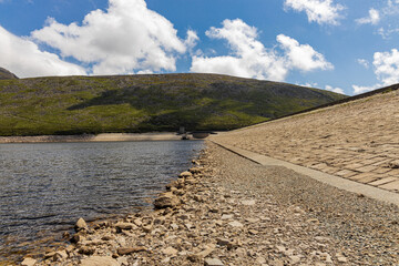 Low water level drought in the Silent Valley reservoir, Mourne mountains, County Down, Northern Ireland, Area of Outstanding Natural Beauty
