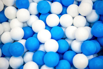 white balls background, room with a lot of white and blue balls 