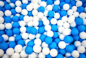 white balls background, room with a lot of white and blue balls 