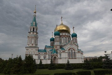 Fototapeta na wymiar Assumption Cathedral (Uspenskiy Kafedralnyy Sobor) in Omsk, Russia