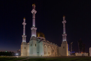 Fototapeta na wymiar Evening view of Nur Astana Mosque in Astana (now Nur-Sultan), capital of Kazakhstan.