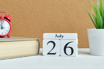 26th july - twenty sixth day month calendar concept on wooden blocks.