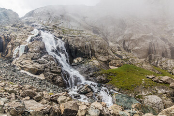 Waterfall near Ala Kul lake in Kyrgyzstan
