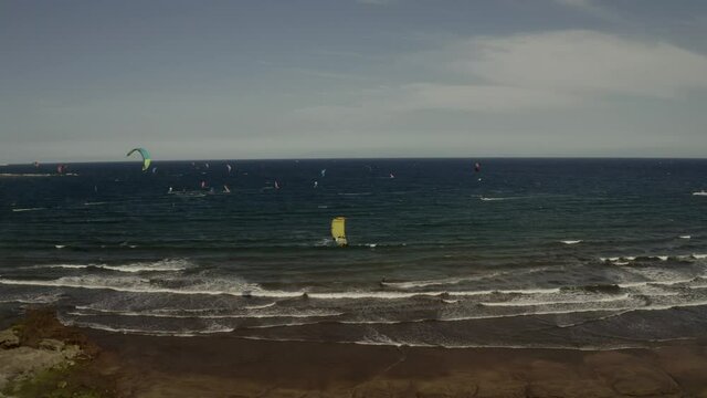 Bay with windsurfers and kiters. Tenerife, Spain