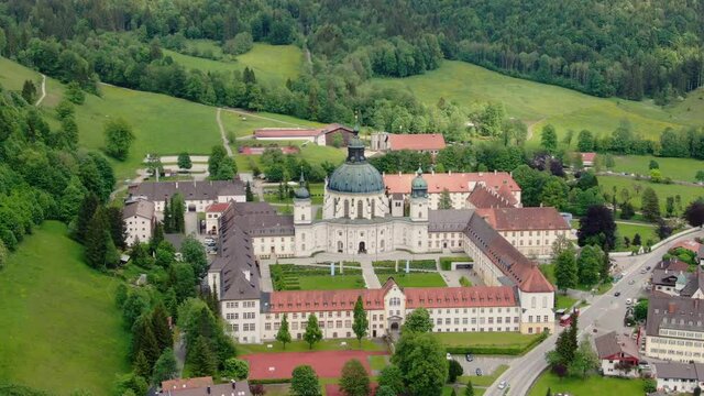 Ettal Abbey, called Kloster Ettal, a monastery in the village of Ettal, Bavaria, Germany - aerial photography