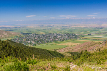Fototapeta na wymiar View of Ak Suu (Teploklyuchenka) village near Karakol, Kyrgyzstan