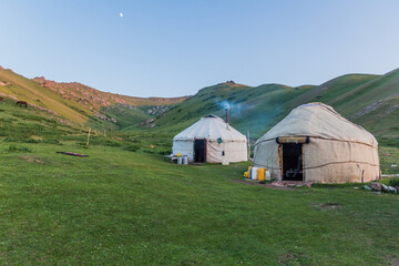 Fototapeta na wymiar Yurt camp in the mountains near Song Kul lake, Kyrgyzstan