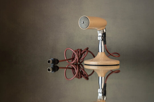 vintage microphone on black background
