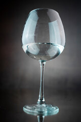 glass of water on black background