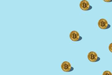 Bitcoin izometric pattern on bright light blue background. Minimal flat lay texture. Abstract trendy fresh concept.