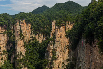 Fototapeta na wymiar Sandstone pillars in Wulingyuan Scenic and Historic Interest Area in Zhangjiajie National Forest Park in Hunan province, China