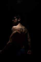 Obraz na płótnie Canvas muscular man with a naked torso