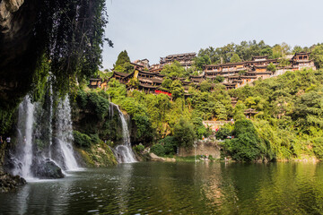 Fototapeta na wymiar Waterfall in Furong Zhen town, Hunan province, China