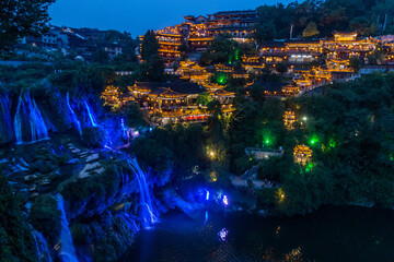 Evening view of Furong Zhen town and waterfall, Hunan province, China