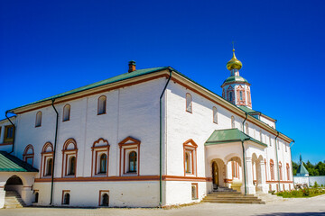 Fototapeta na wymiar It's Part of the Valday Iversky Monastery, a Russian Orthodox monastery founded by Patriarch Nikon in 1653. Lake Valdayskoye in Valdaysky District of Novgorod Oblast, Russia,