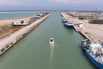 Fototapeta na wymiar Boat go to sea in Pescara, Italy