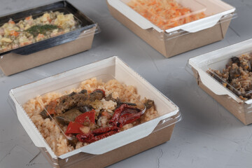 Food in eco packaging - lunch boxes for delivery.