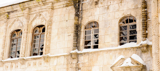 Broken windows of the building of  the Fedorov town, complex of buildings in the town of Pushkin,...