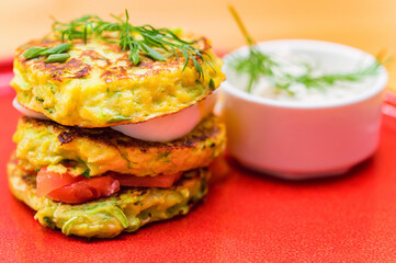 A stack of home-made pancakes with cheese and salmon