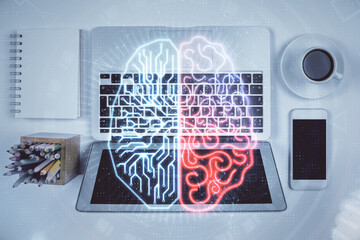 Double exposure of brain drawing hologram over topview work table background with computer. Concept of big data.