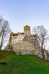 It's Bran Castle (Dracula Castle) on the top of the rock, Transylvania, Bran, Romania