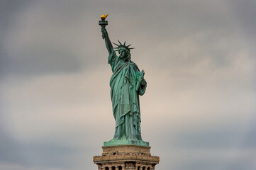 Obraz premium Statue of Liberty of New York on a cloudy day, NY, United Sates of America