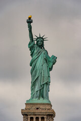 Obraz premium Statue of Liberty of New York on a cloudy day, NY, United Sates of America