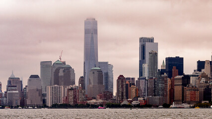 Fototapeta premium Beautiful panoramic view of the Downtown of Manhattan on a cloudy day, NY, United Sates of America