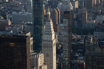 Obraz premium Views over the top of a New York building. Panoramic views of a big city like New York at sunset.