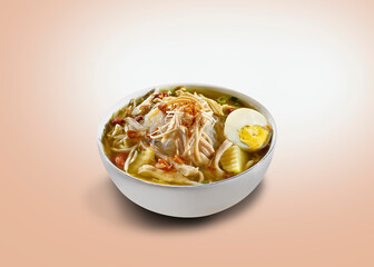 Soto Ayam or Chicken Soto. Yellow chicken soup containing cabbage, vermicelli, potato slices, celery, leeks, tomato, fried onions.