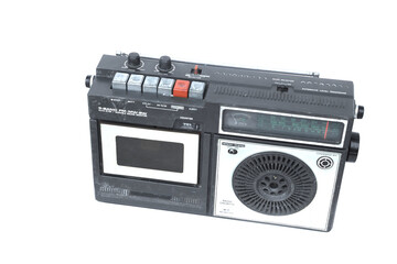 Old radio cassette on a white background