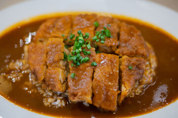 Close up japanese curry topped with pork cutlet aka tonkatsu 
