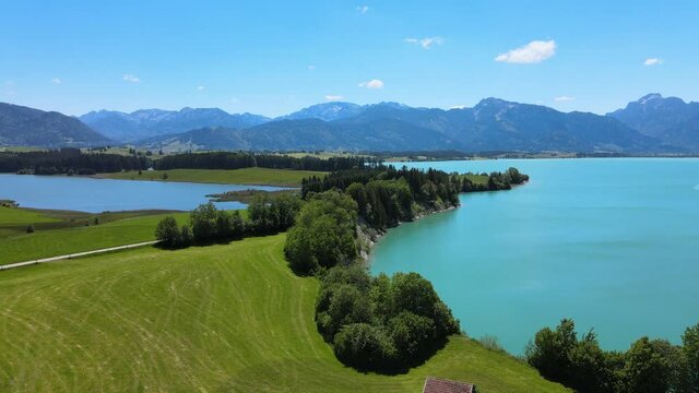 Aerial view over Lake Forggensee at the city of Fuessen in Bavaria Germany