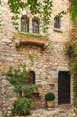 Old buildings and narrow cobblestone streets in a picturesque medieval city of Eze Village in South of France along Mediterranean Sea