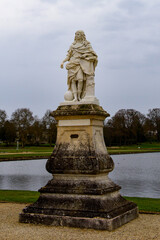 Fototapeta na wymiar Statue in the gardens of th eCastle of Chantilly, one of the famous chateau in France