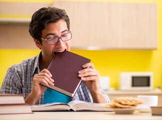 Student preparing for exam sitting at the kitchen