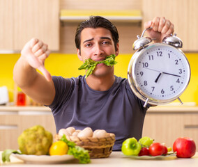 Young man in dieting and healthy eating concept