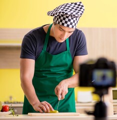 Young chef blogger explaining food preparation