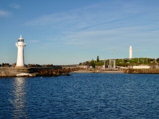 Fototapeta na wymiar A view of lighthouses at Wollongong harbor in south of Sydney, Australia