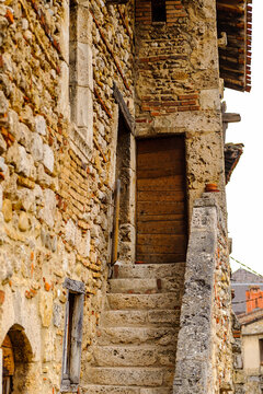 Old stone house in  Perouges, France, a medieval walled town, a popular touristic attraction.