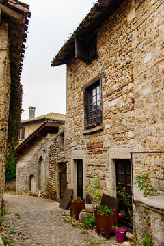 Street of Perouges, France, a medieval walled town, a popular touristic attraction.