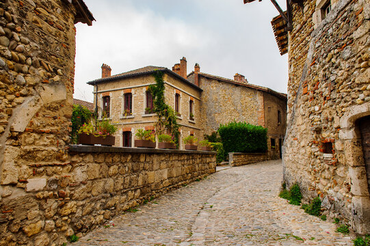 Street of Perouges, France, a medieval walled town, a popular touristic attraction.
