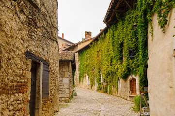 Fototapeta na wymiar Perouges, France, a medieval walled town, a popular touristic attraction.
