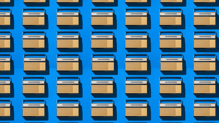 Seamless pattern of old radios on a blue background.