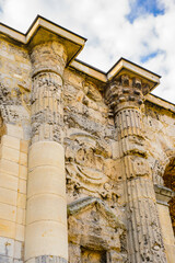 It's Porte Mars, an ancient Roman triumphal arch in Reims, France.