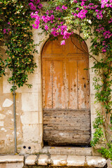 Fototapeta na wymiar It's Door of the Old medieval house of Saint Paul de Vence, France