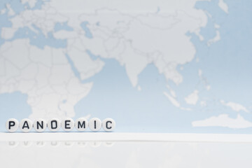 The word pandemic over world map